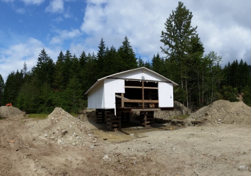 14 Barn lifted and ready for work, excavator to the west